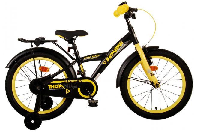 Volare Thombike Kinderfiets - Jongens - 18 inch - Zwart Geel: Luxe zwarte jongensfiets met gele accenten, handrem, terugtraprem, gesloten kettingkast, afneembare zijwieltjes, zacht zadel, handige achterdrager, verstelbaar stuur en extra lange zadelpen voor groeiend kind, inclusief montagemateriaal, veilig en comfortabel, bij Fitmarktnl