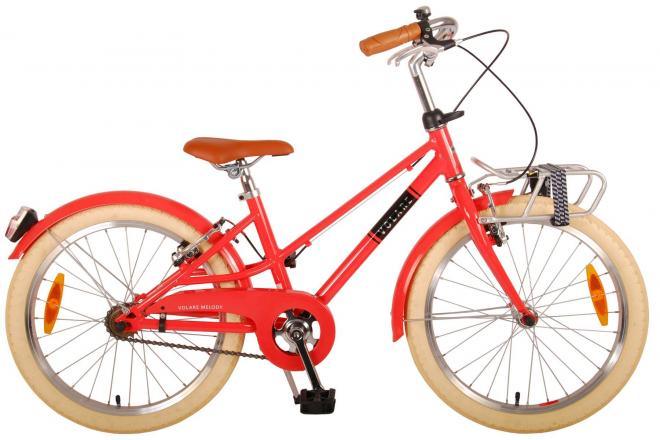 Volare Melody 20 inch meisjesfiets in koraal rood met handremmen, reflectoren, verlichting, bel, voordrager, standaard, verstelbaar stuur en extra lange zadelpen voor groei
