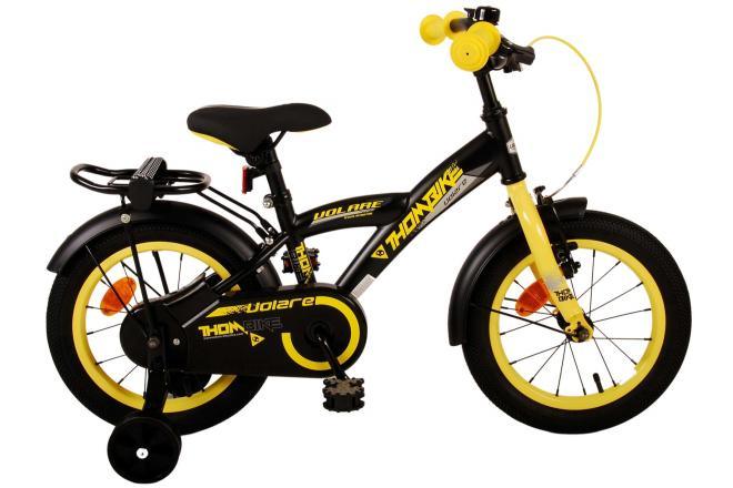 Volare Thombike 14 inch jongensfiets in zwart en geel met handrem, terugtraprem, zijwieltjes, gesloten kettingkast, bel, zacht zadel, verstelbaar stuur en zadel, en extra lange spatborden